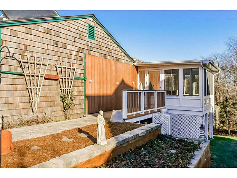 95 Long Meadow Road Portsmouth, RI 02871 - Photo 22 of 25 Patio/Deck. Side garden and patio area