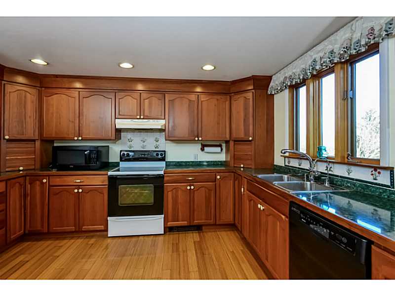 95 Long Meadow Road Portsmouth, RI 02871 - Photo 6 of 25 Kitchen. bamboo floor, room for table, shown with island removed