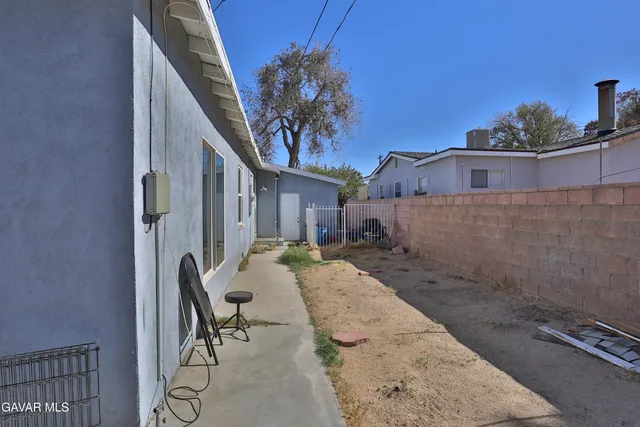 a view of a house with a patio