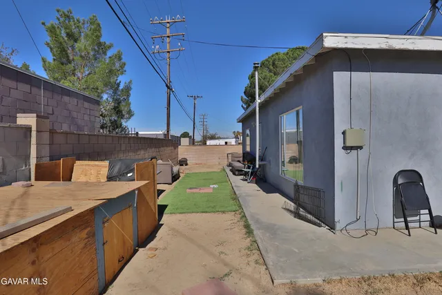 a backyard of a house with seating space