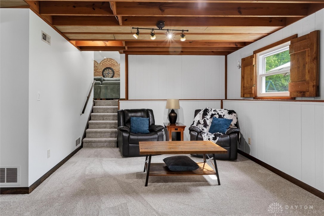 2165 Stewart Road Xenia, OH 45385 - Photo 18 of 59 This versatile recreation room offers comfortable living and ample space for relaxation and entertainment.