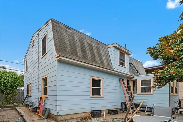a view of a house with a street