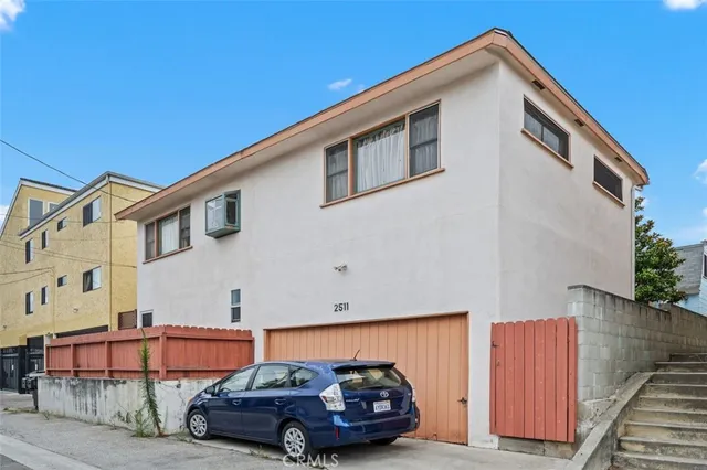 a car parked in front of a building