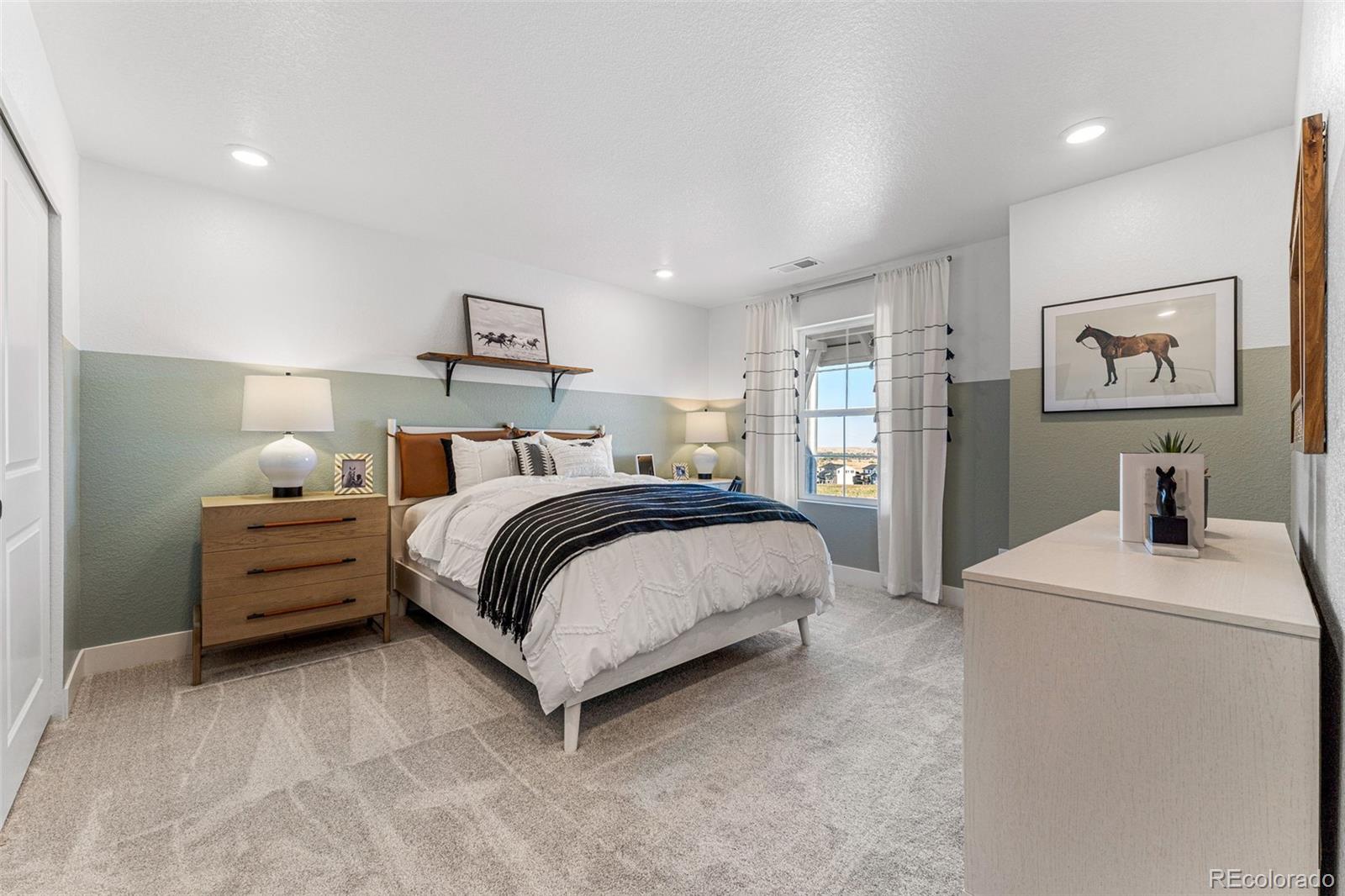39782 Penn Road Elizabeth, CO 80107 - Photo 26 of 37 a bedroom with a bed and a desk