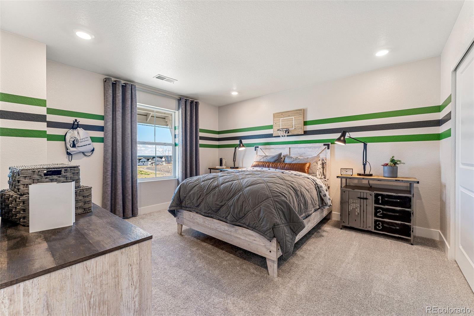 39782 Penn Road Elizabeth, CO 80107 - Photo 27 of 37 a bedroom with a bed and a window