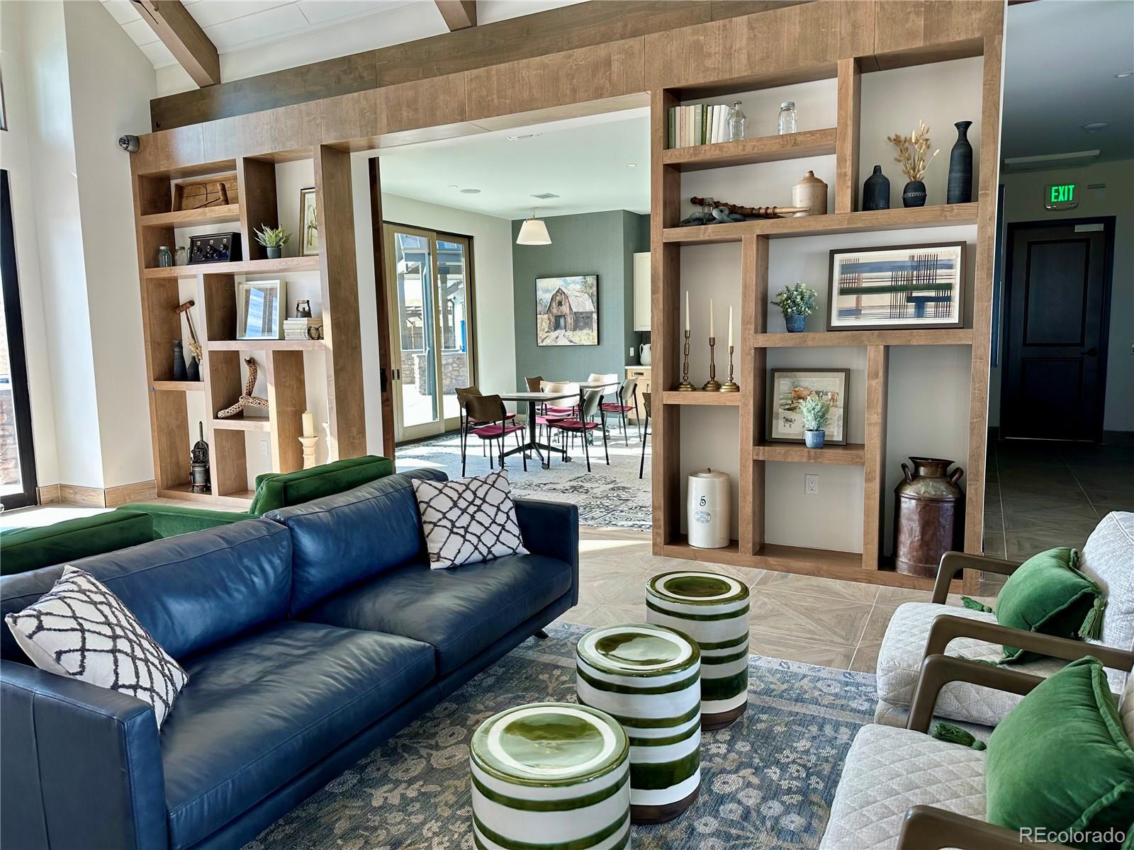 39782 Penn Road Elizabeth, CO 80107 - Photo 36 of 37 a living room with furniture and a floor to ceiling window