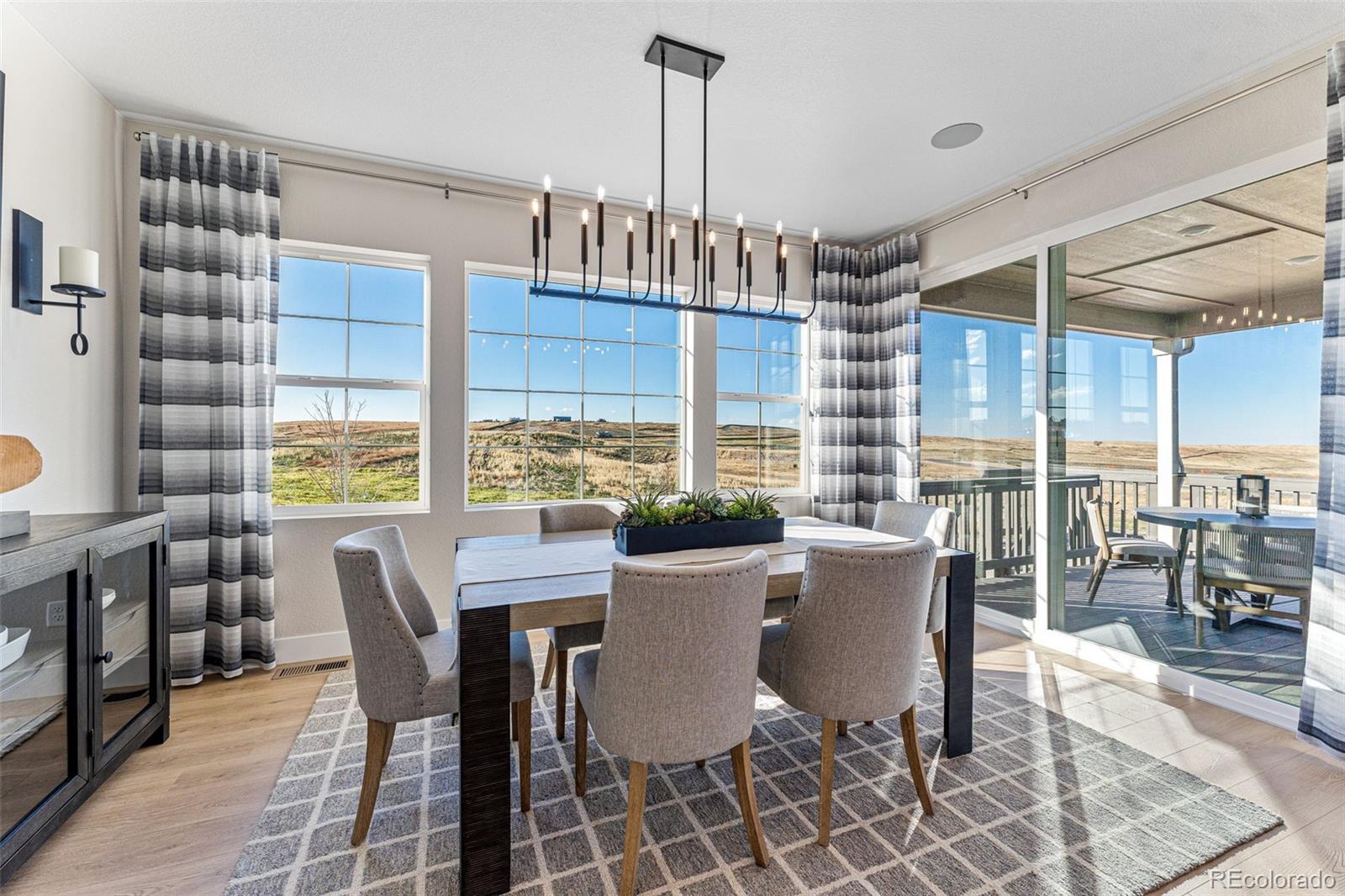 39782 Penn Road Elizabeth, CO 80107 - Photo 9 of 37 a view of a dining room with furniture window and outside view