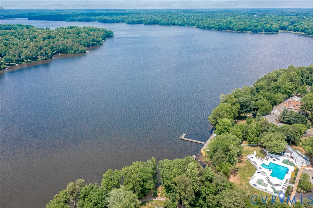 13402 Poplar Grove Place Midlothian, VA 23112 - Photo 49 of 52 a backyard of a house with lots of green space and lake view