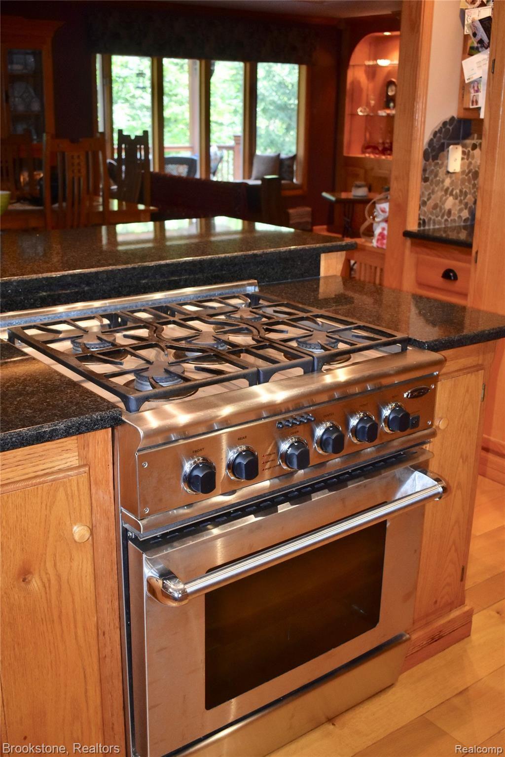 405 Baldwin Ridge Oxford, MI 48371 - Photo 29 of 54 CHECK-OUT THE "CUSTOM" BUILT-IN 6 BURNER GAS STOVE
