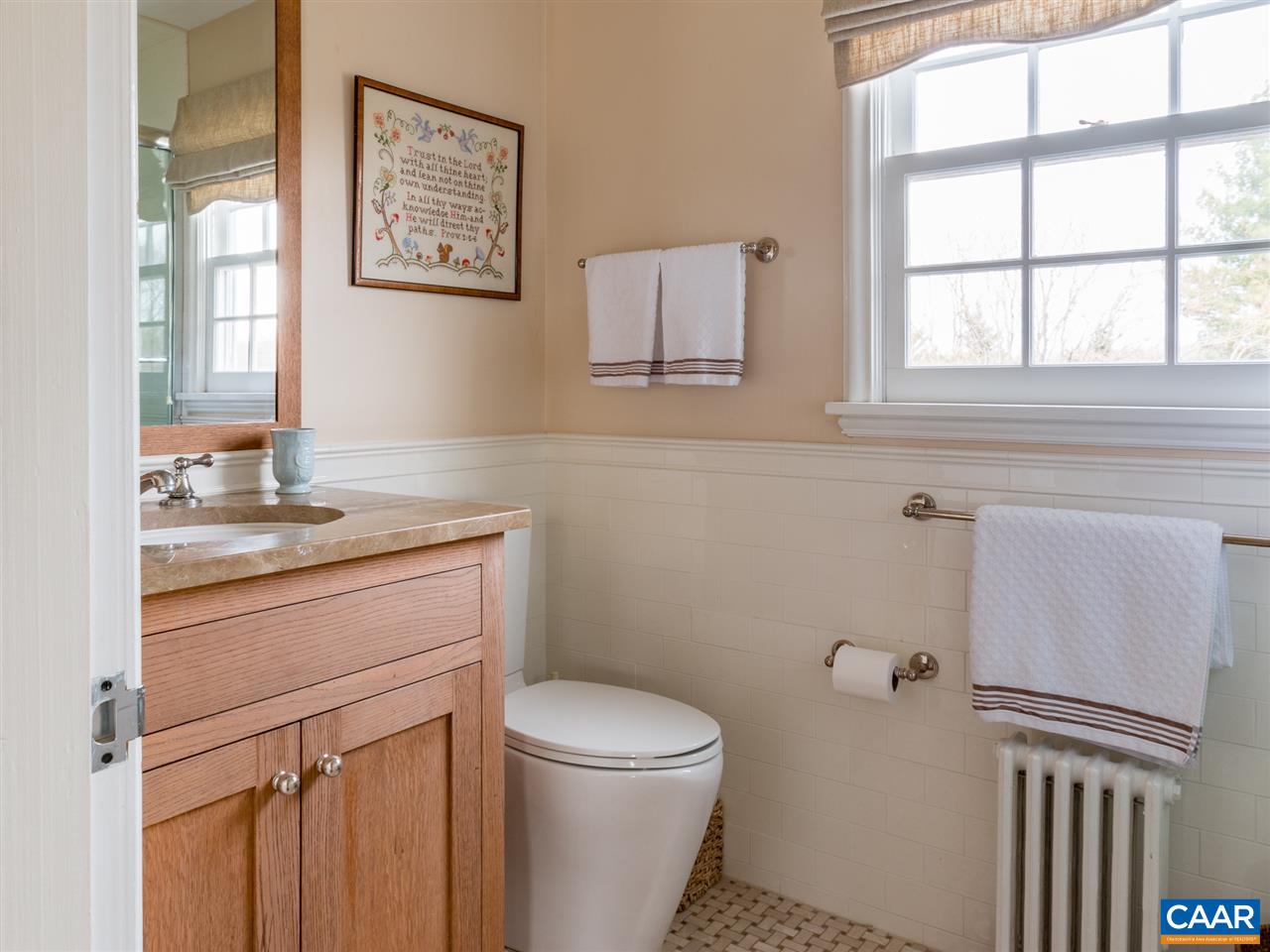 1968 Stony Point Road Charlottesville, VA 22911 - Photo 44 of 50 a bathroom with a granite countertop toilet sink and mirror