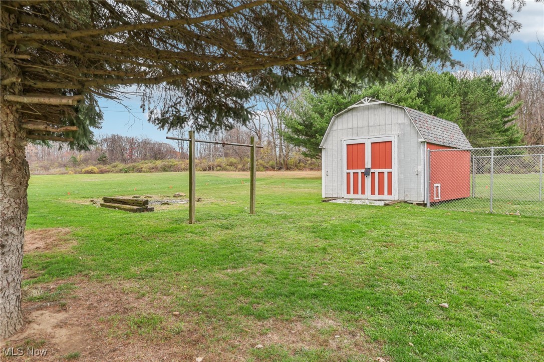 45375 North Ridge Road Amherst, OH 44001 - Photo 35 of 50 View of yard with a shed