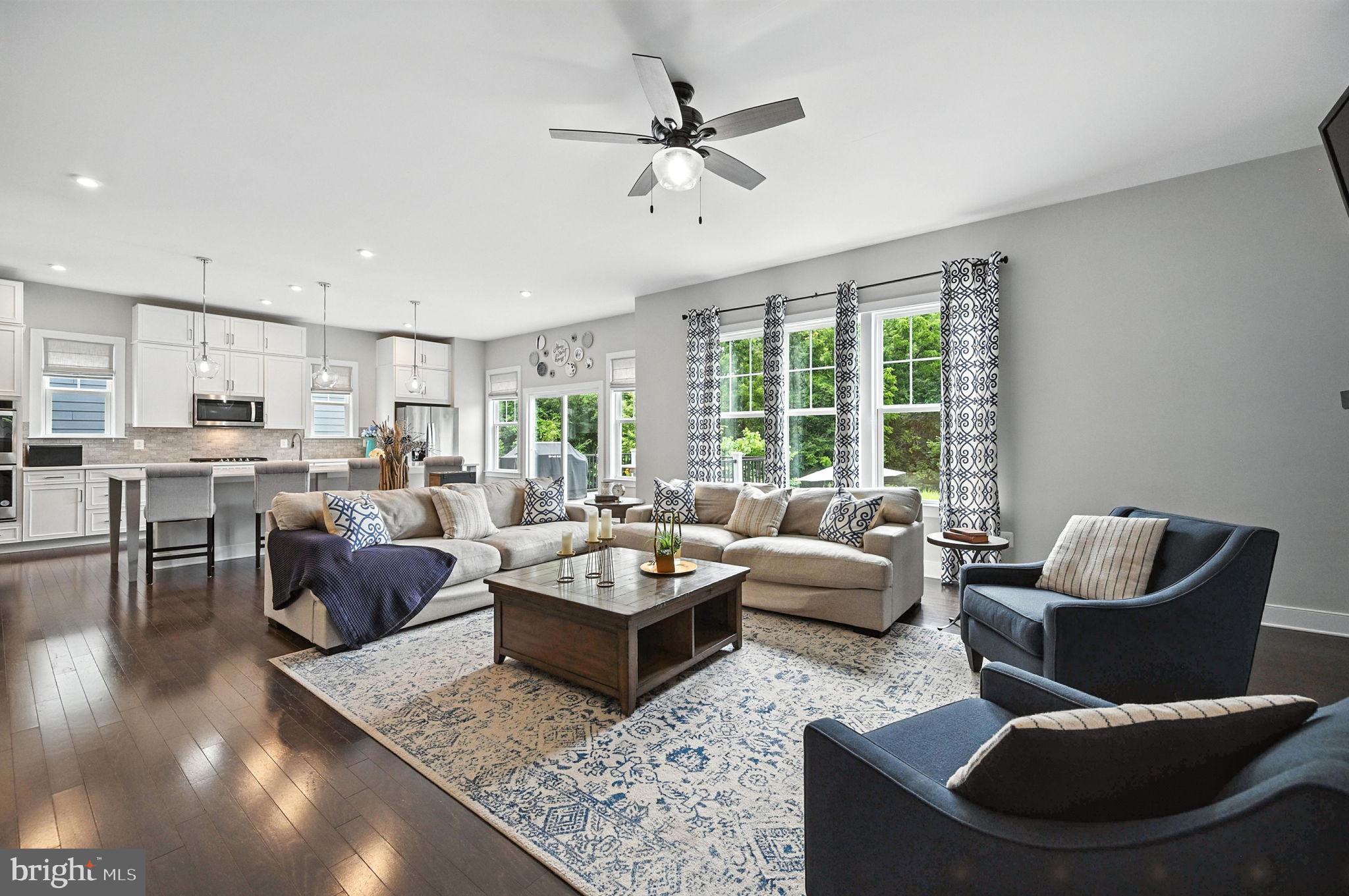 40960 River Cane Place Aldie, VA 20105 - Photo 19 of 54 a living room with furniture and a large window