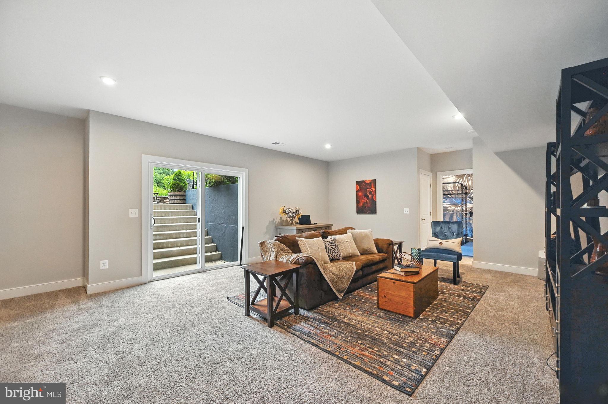 40960 River Cane Place Aldie, VA 20105 - Photo 26 of 54 a living room with furniture and a window