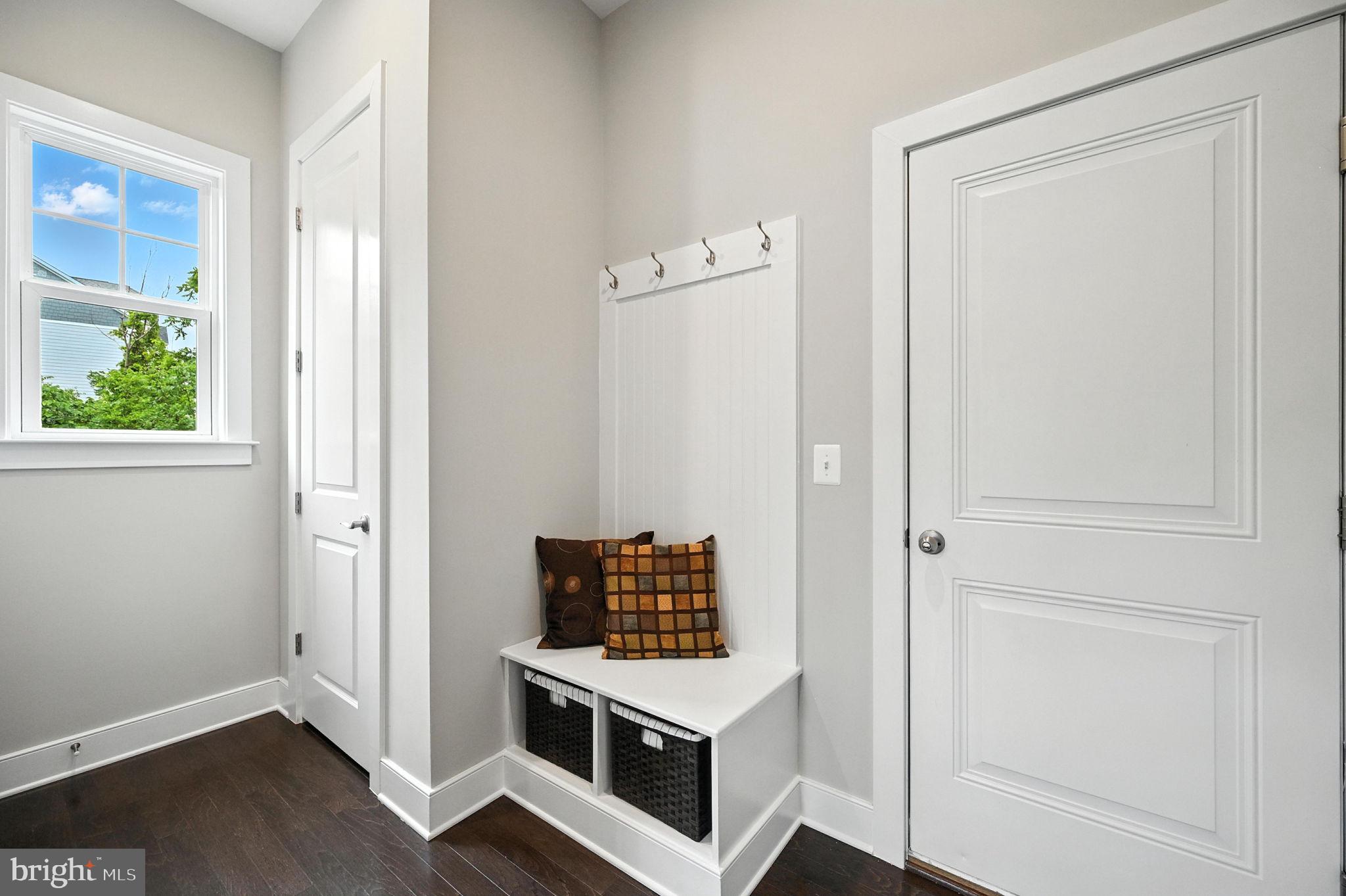40960 River Cane Place Aldie, VA 20105 - Photo 39 of 54 a room with wooden floor and white doors