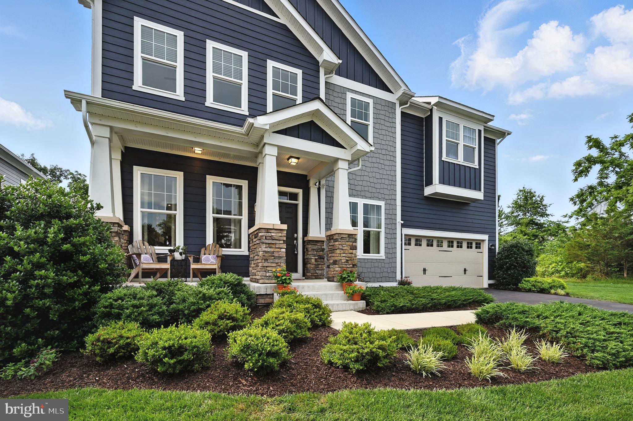40960 River Cane Place Aldie, VA 20105 - Photo 48 of 54 front view of a house with a yard
