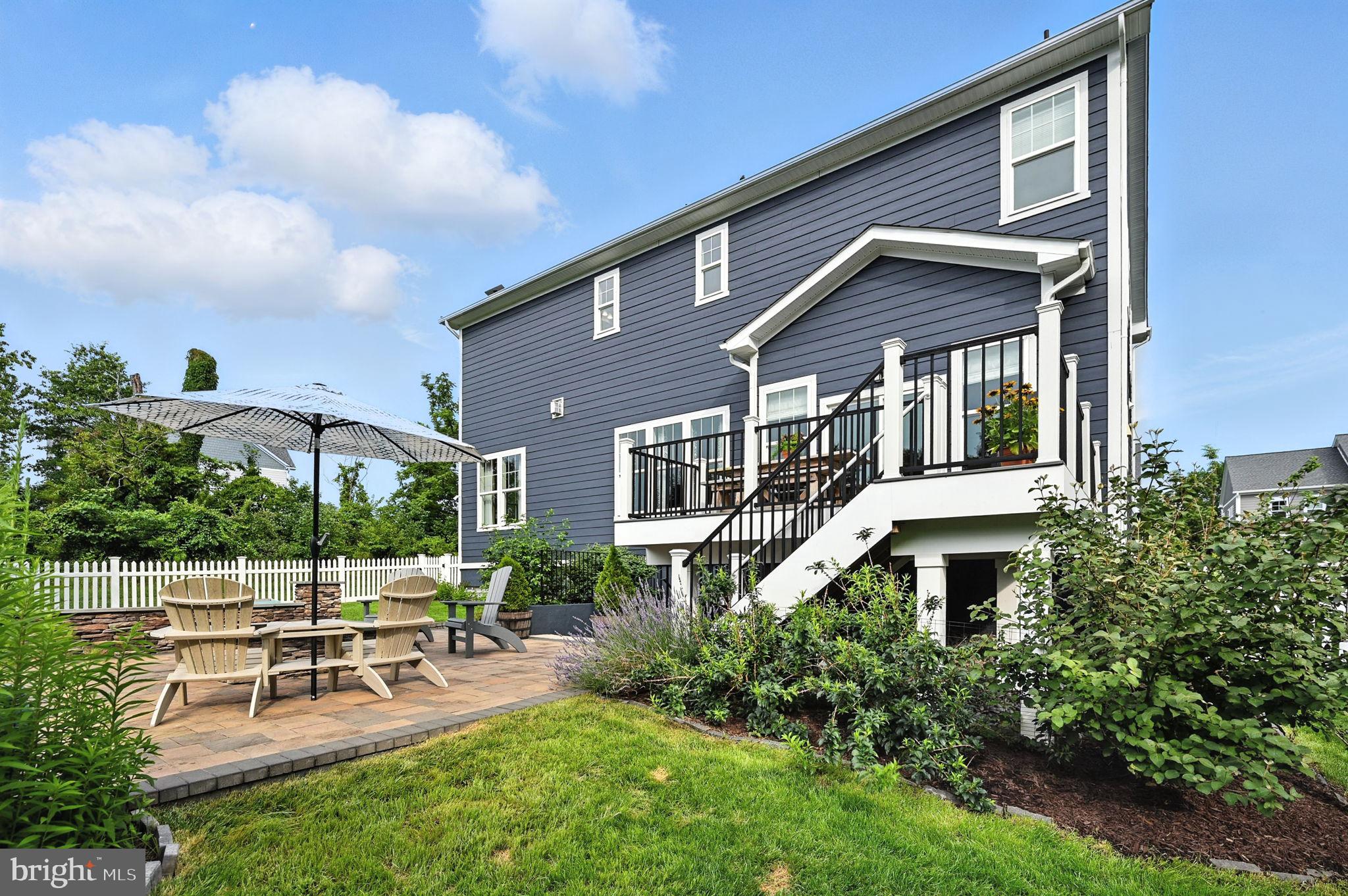40960 River Cane Place Aldie, VA 20105 - Photo 51 of 54 a view of a house with a yard and sitting area