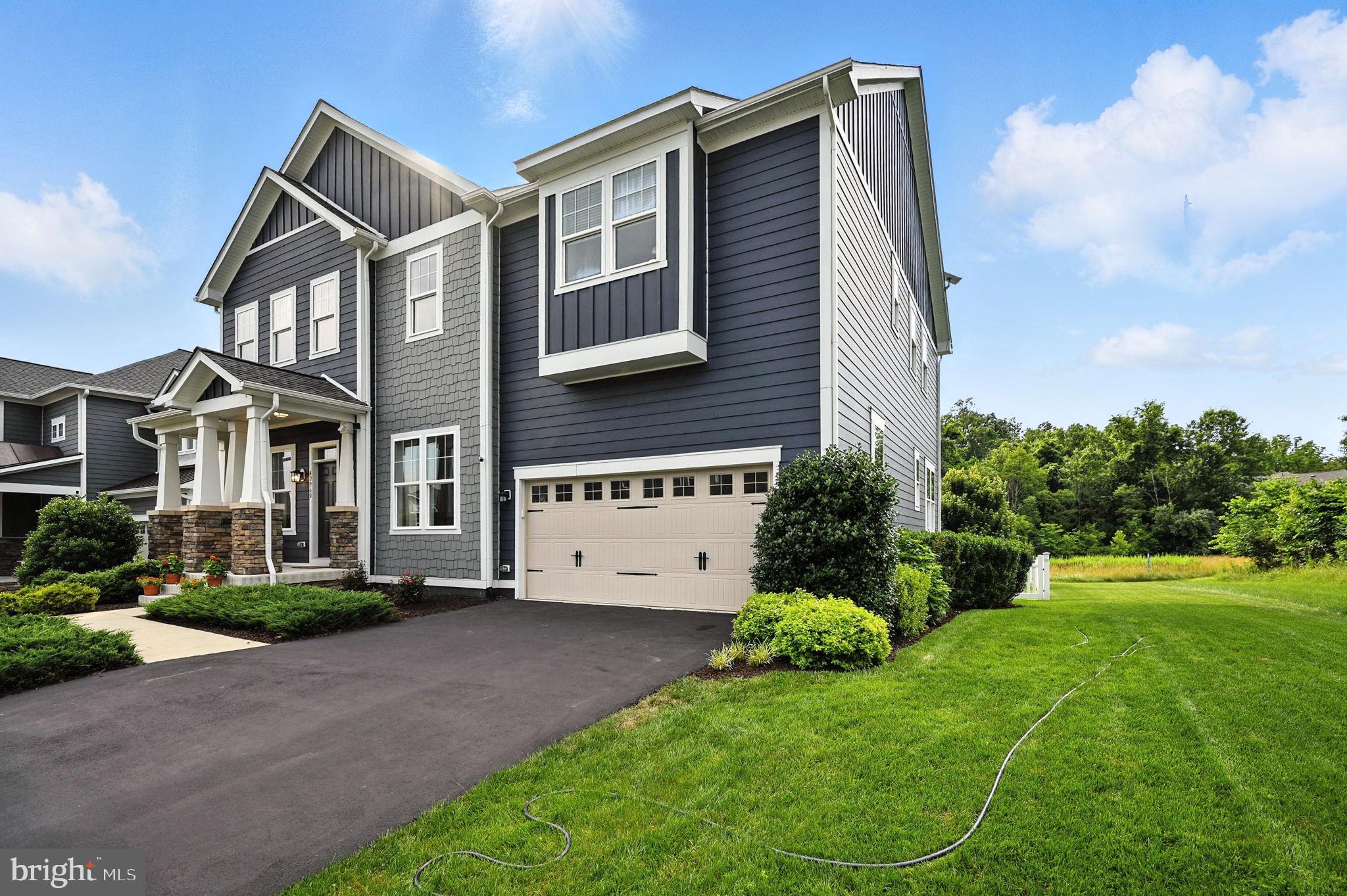 40960 River Cane Place Aldie, VA 20105 - Photo 53 of 54 a view of a house with a yard