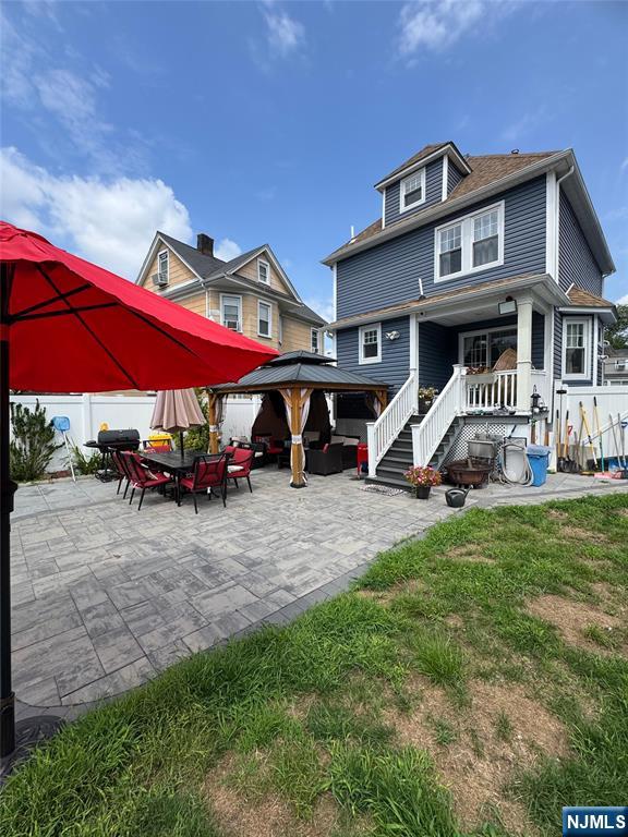 17 Elm Street Ridgefield Park, NJ 07660 - Photo 13 of 15 a view of a house with a yard