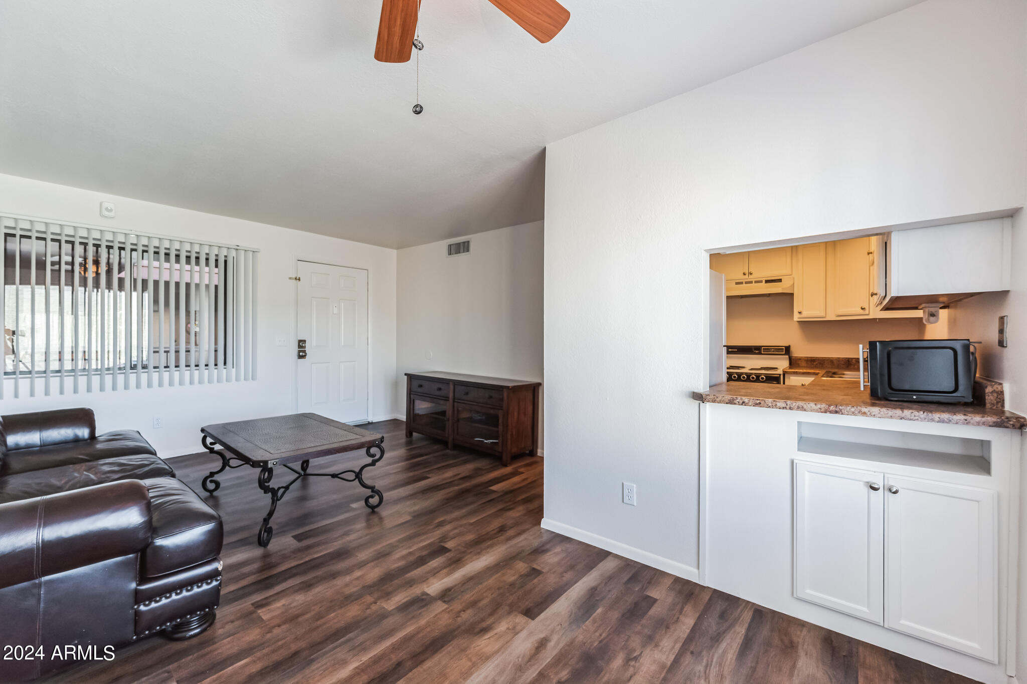 17 East Ruth Avenue, Unit 301 Phoenix, AZ 85020 - Photo 4 of 16 open kitchen to dining