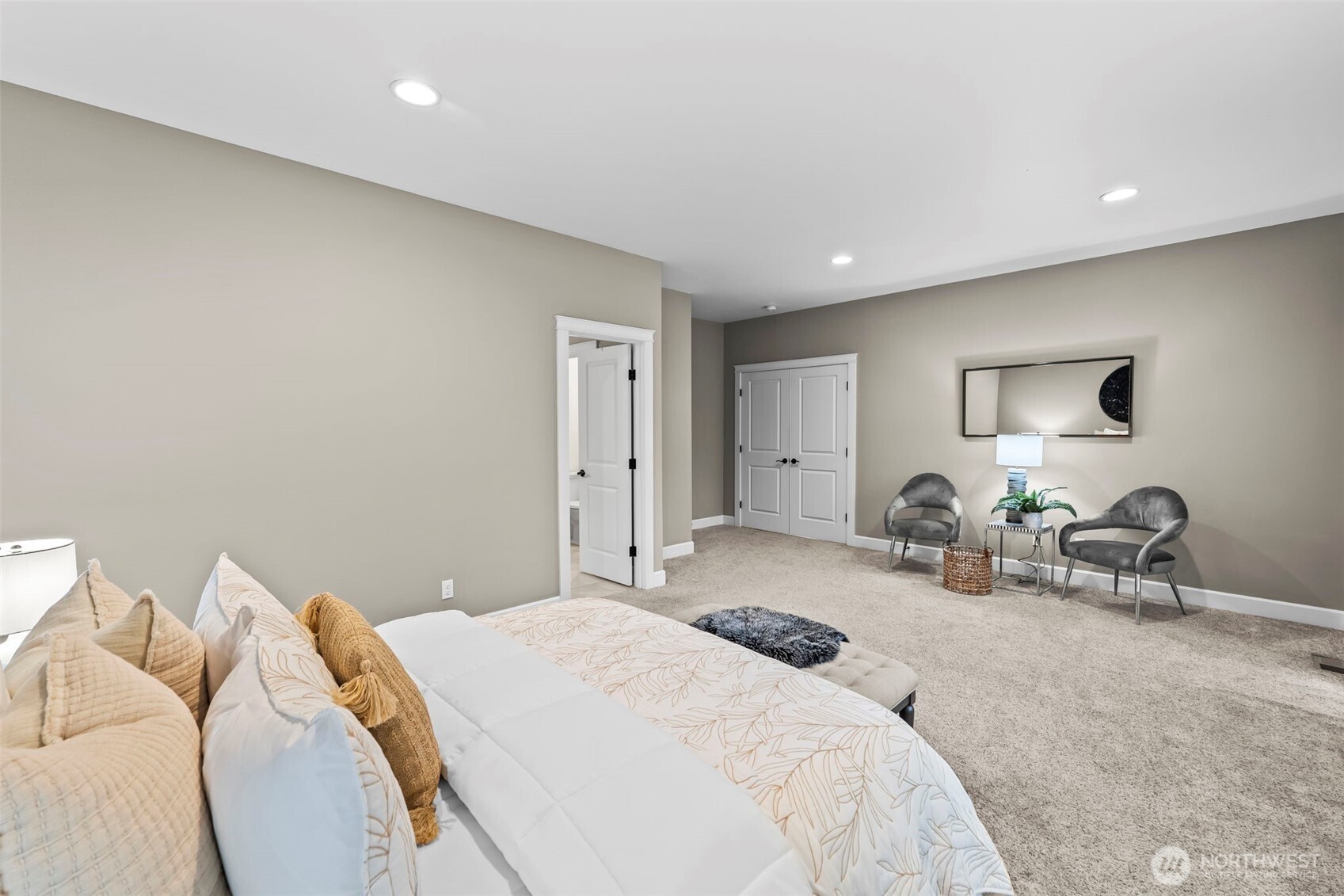 14892 Peacock Hill Road Southeast Olalla, WA 98359 - Photo 21 of 40 a bedroom with bed and window