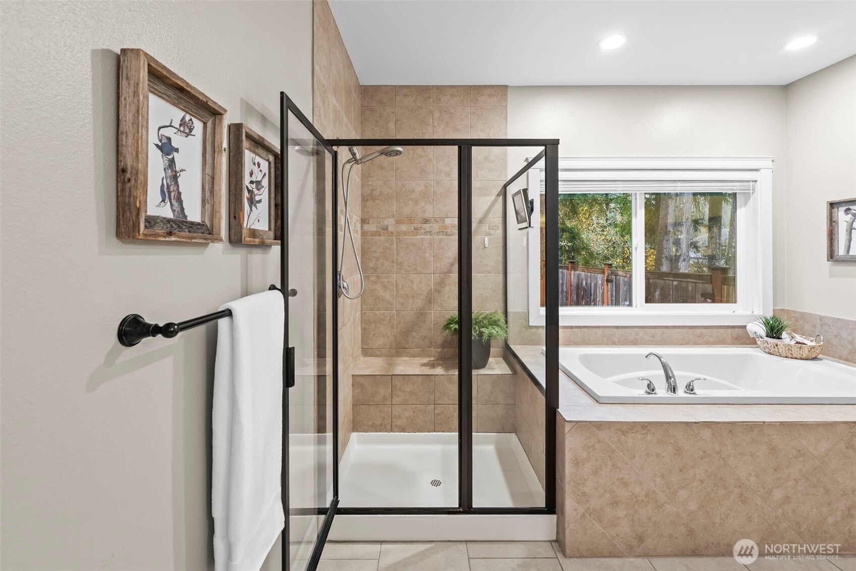 14892 Peacock Hill Road Southeast Olalla, WA 98359 - Photo 25 of 40 a spacious bathroom with a tub and a shower