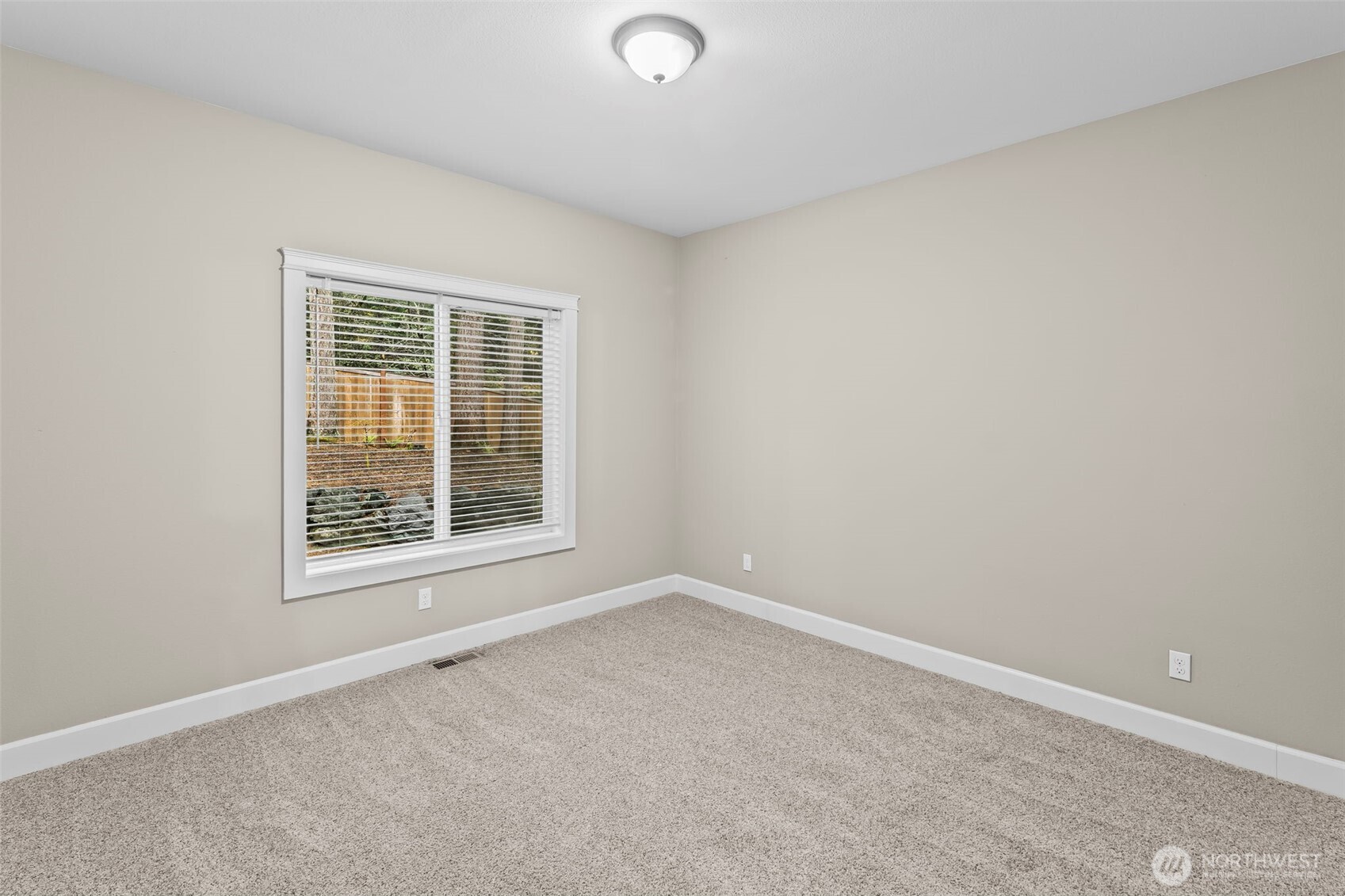 14892 Peacock Hill Road Southeast Olalla, WA 98359 - Photo 29 of 40 an empty room with a window