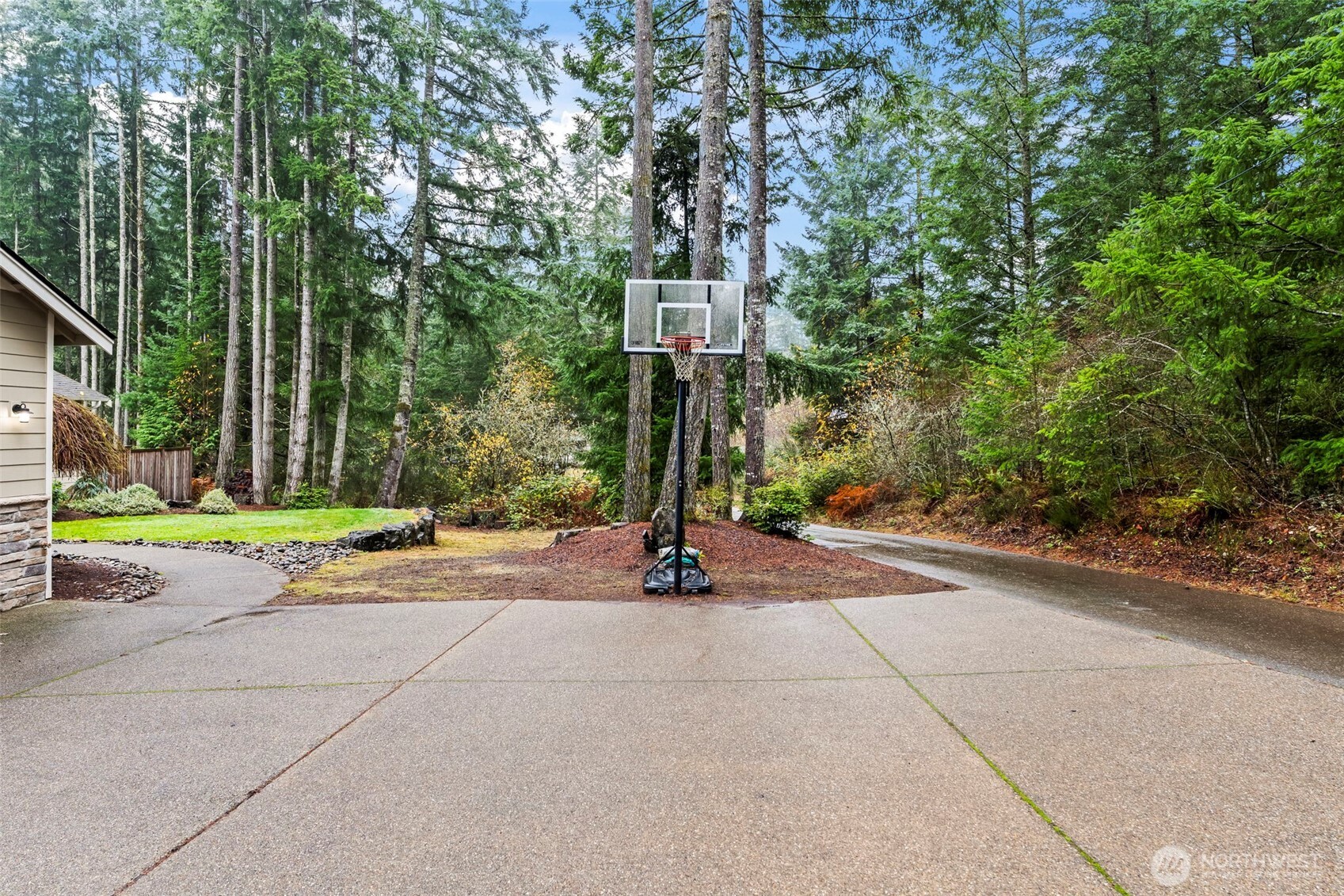 14892 Peacock Hill Road Southeast Olalla, WA 98359 - Photo 39 of 40 a street view with a bench