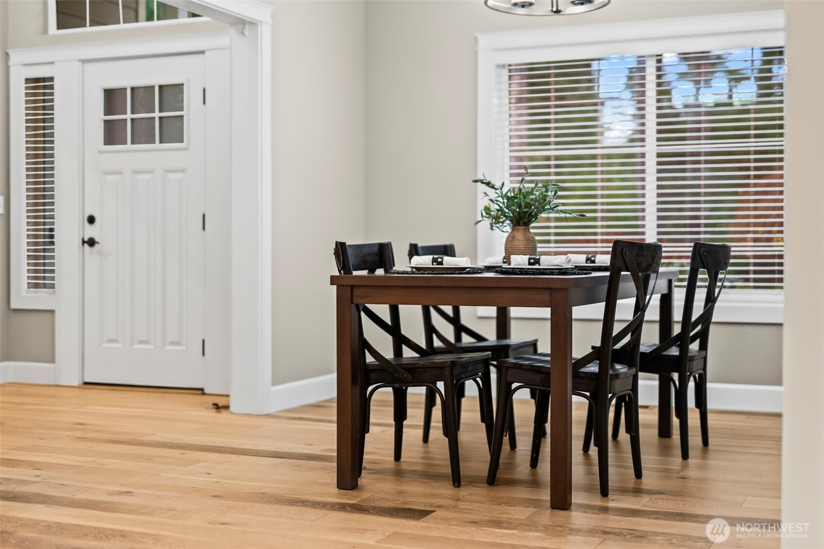 14892 Peacock Hill Road Southeast Olalla, WA 98359 - Photo 6 of 40 a dining room with furniture and wooden floor