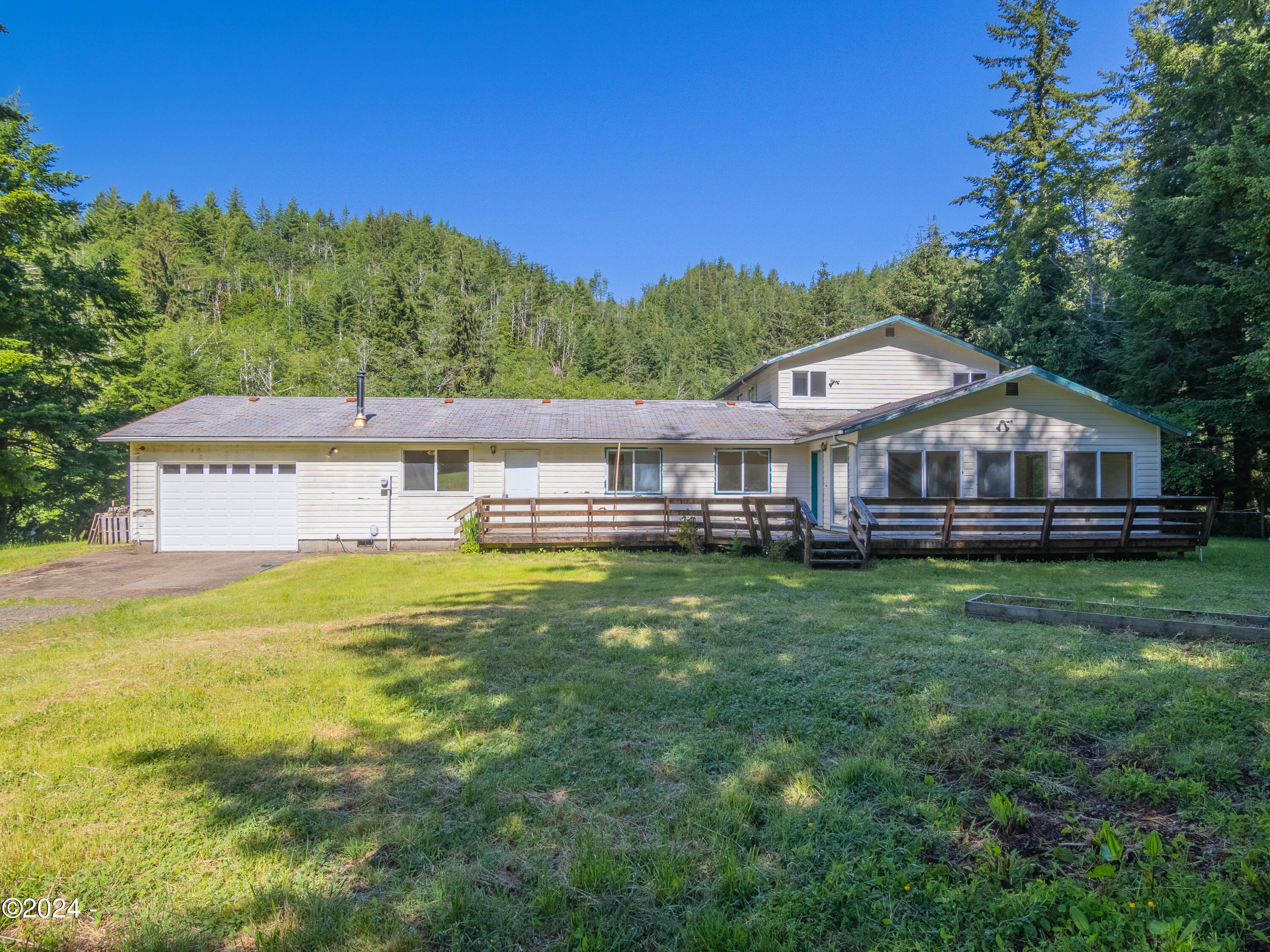 909 Christiansen Road Toledo, OR 97391 - Photo 1 of 43 909 front