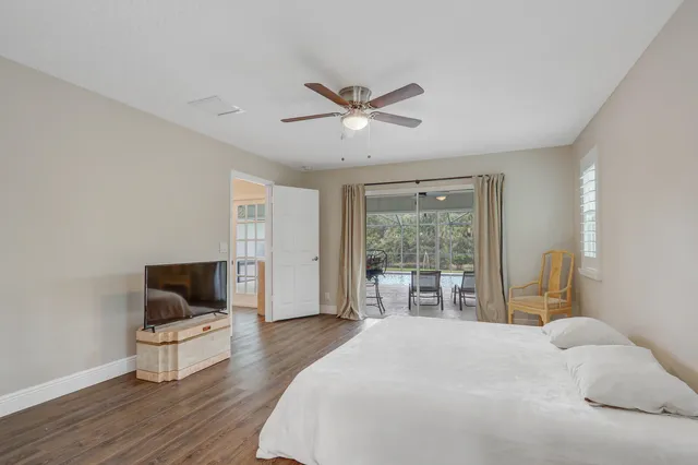 a bathroom with a sink toilet and mirror
