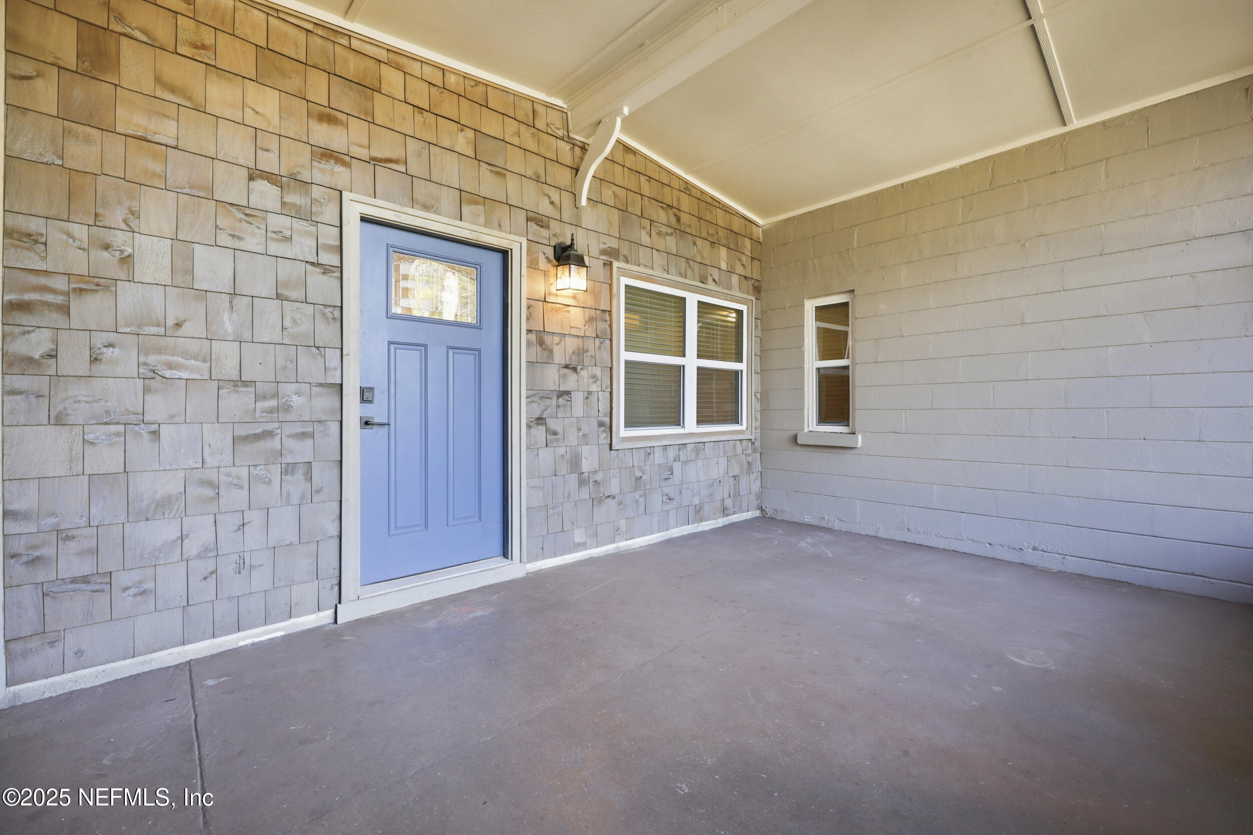 7110 Waikiki Road Jacksonville, FL 32216 - Photo 5 of 39 Front screened porch