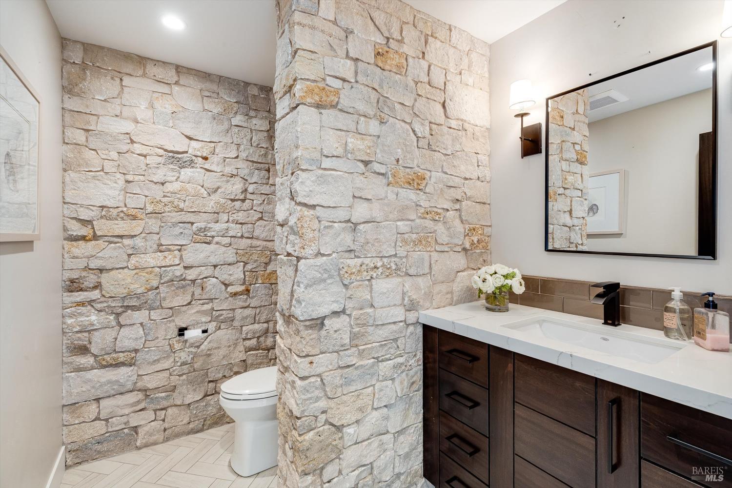 2929 Atlas Peak Road Napa, CA 94558 - Photo 18 of 56 a bathroom with a sink a toilet and a shower