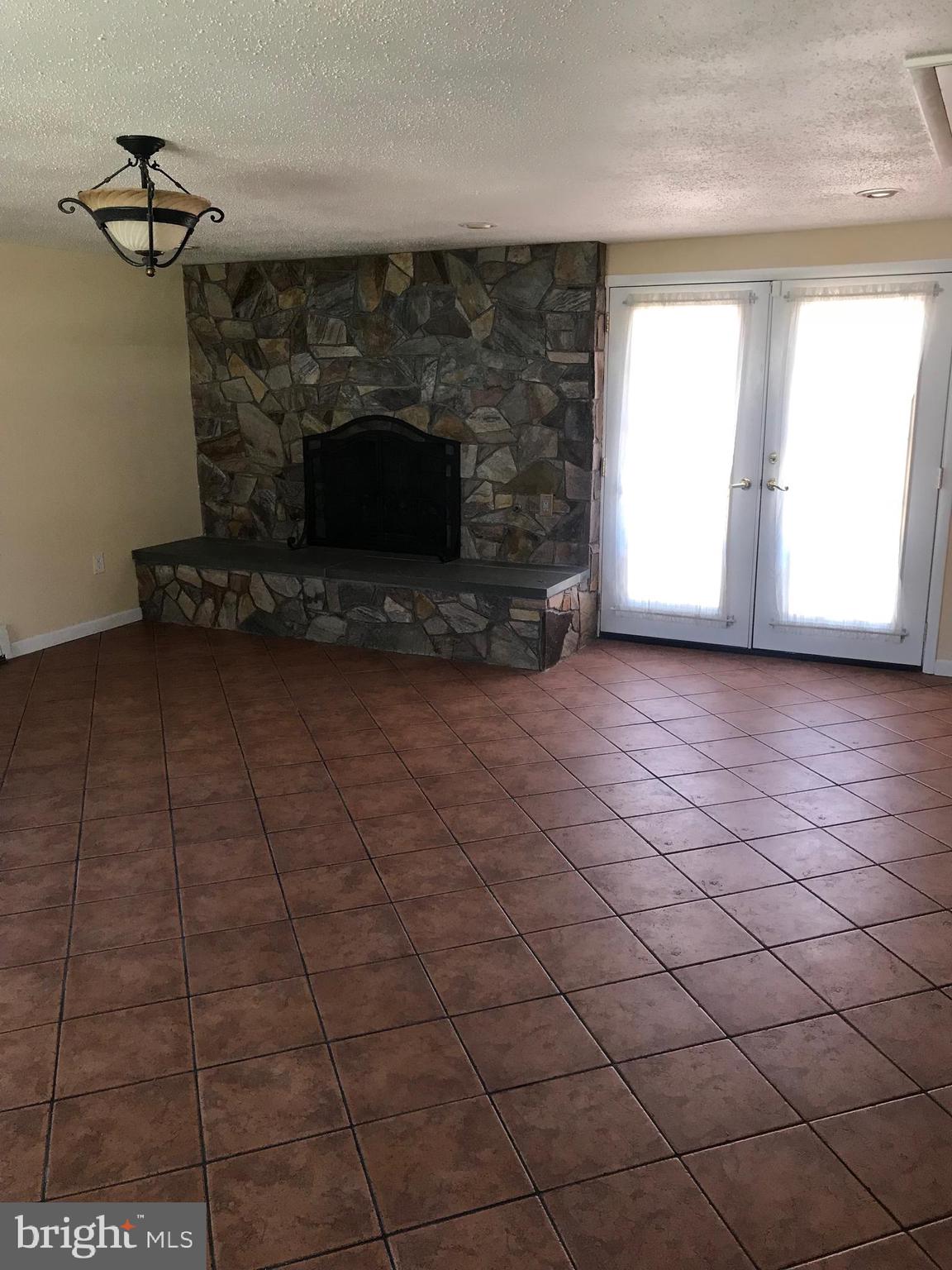 15401 Michigan Rd. Woodbridge, VA 22191 - Photo 13 of 24 Large Family room with cozy fireplace