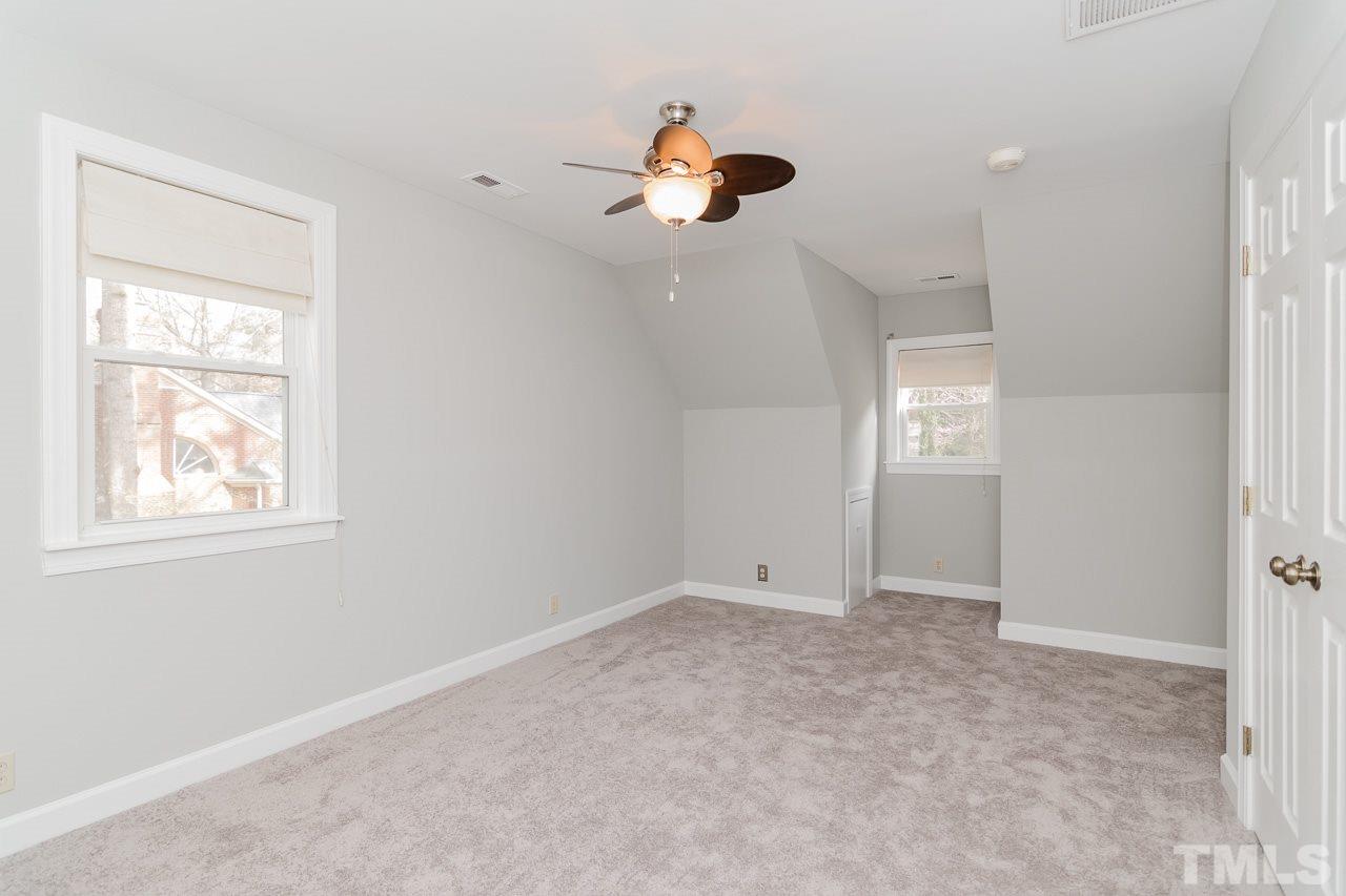 1404 Onslow Road Raleigh, NC 27606 - Photo 17 of 30 wooden floor in an empty room with a window