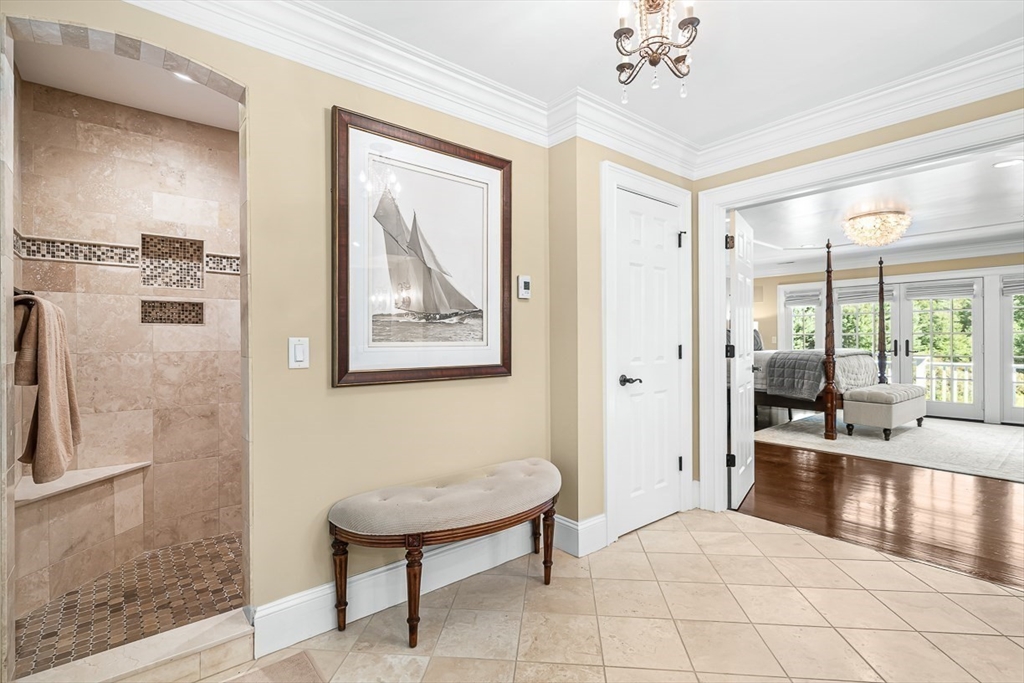 33 Old Concord Road Lincoln, MA 01773 - Photo 24 of 42 a view of a hallway with workspace and a mirror
