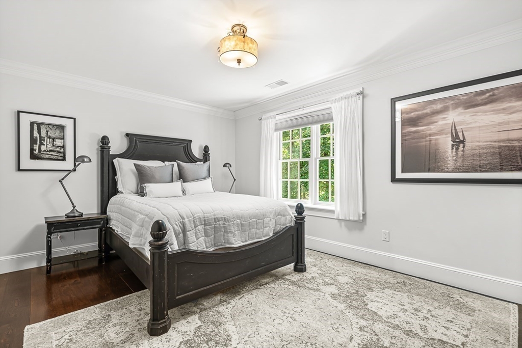 33 Old Concord Road Lincoln, MA 01773 - Photo 28 of 42 a bedroom with a bed and a window