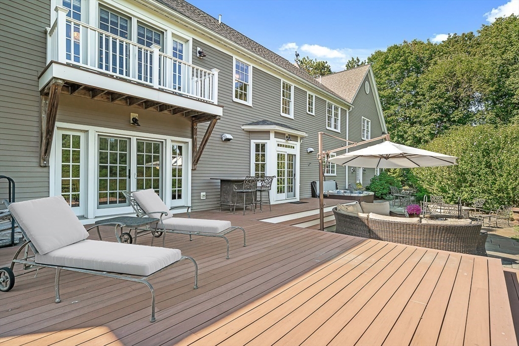 33 Old Concord Road Lincoln, MA 01773 - Photo 35 of 42 a building outdoor space with patio furniture