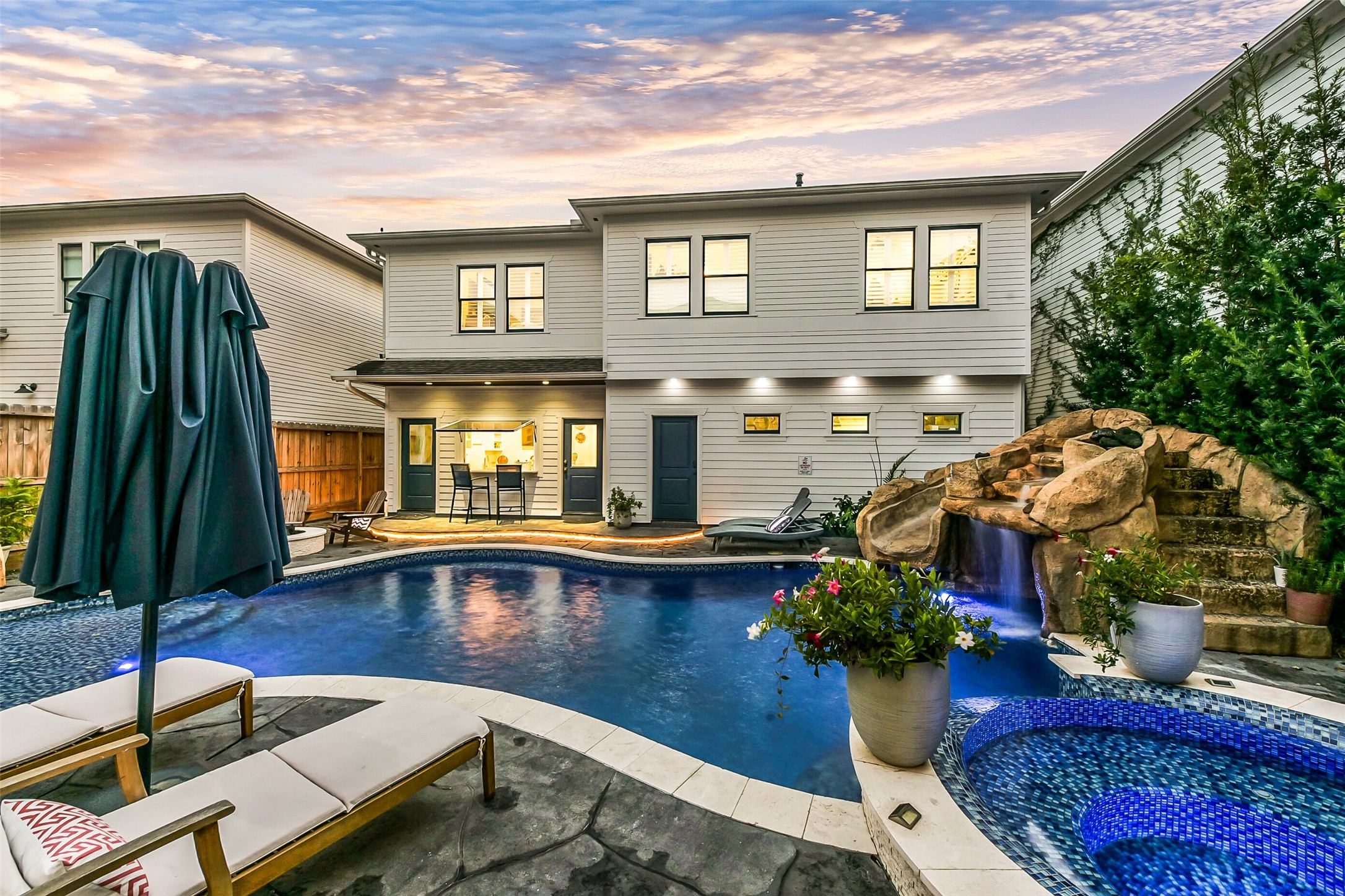 508 East 25th Street Houston, TX 77008 - Photo 34 of 45 Enjoy the waterslide & waterfall grotto just beyond the upgraded glass-tiled spa.