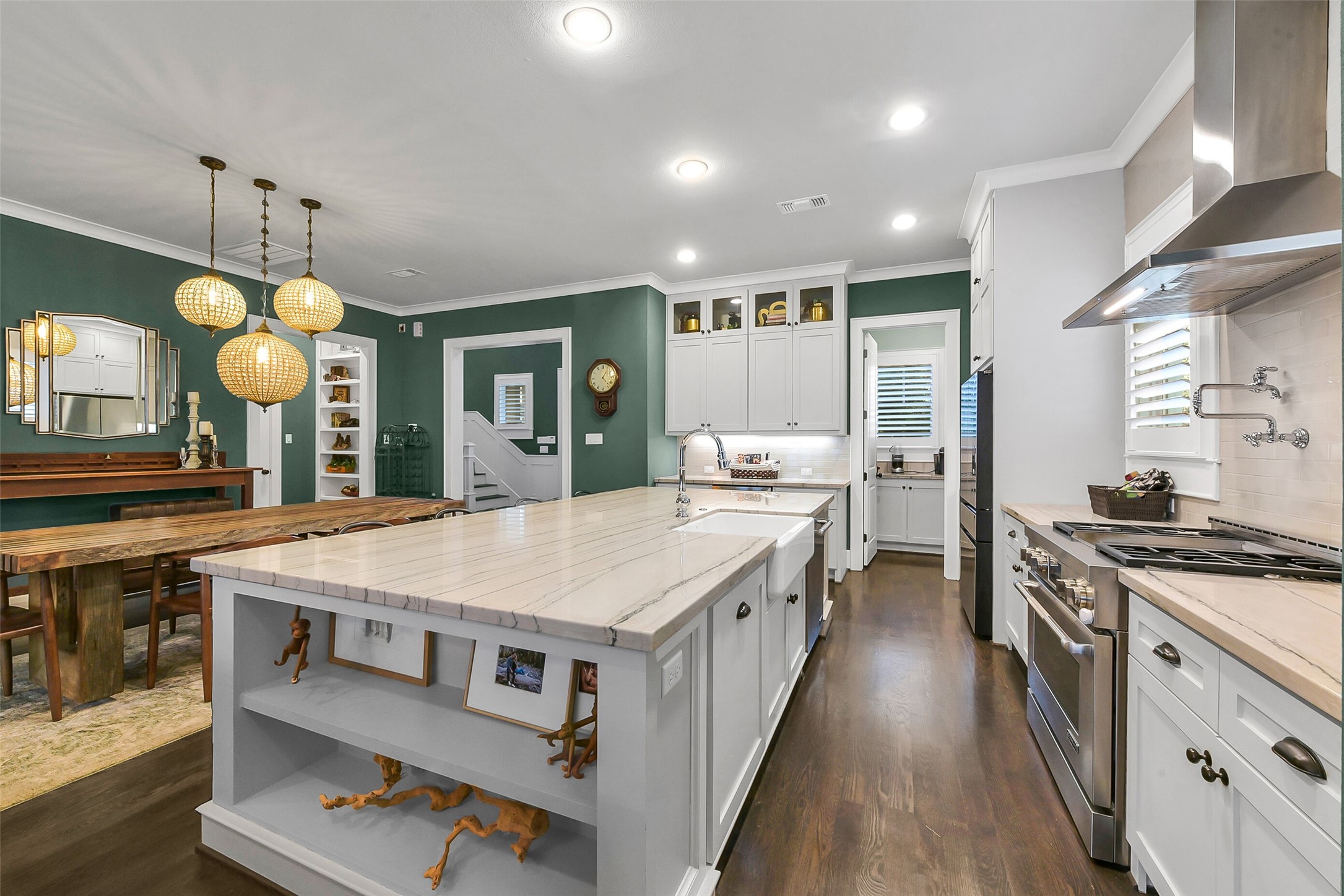 508 East 25th Street Houston, TX 77008 - Photo 10 of 45 The kitchen features ample cabinet space and counter tops for the most discerning cooks. Note the large pantry at the front of the kitchen with counterspace to allow appliances and less sightly items to be kept in a private space.