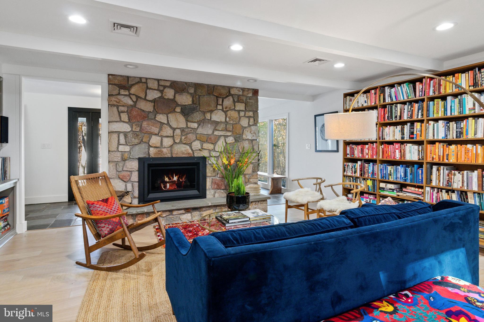 7036 Upper York Road New Hope, PA 18938 - Photo 14 of 45 Awesome Room w/ stone gas fireplace & book shelves