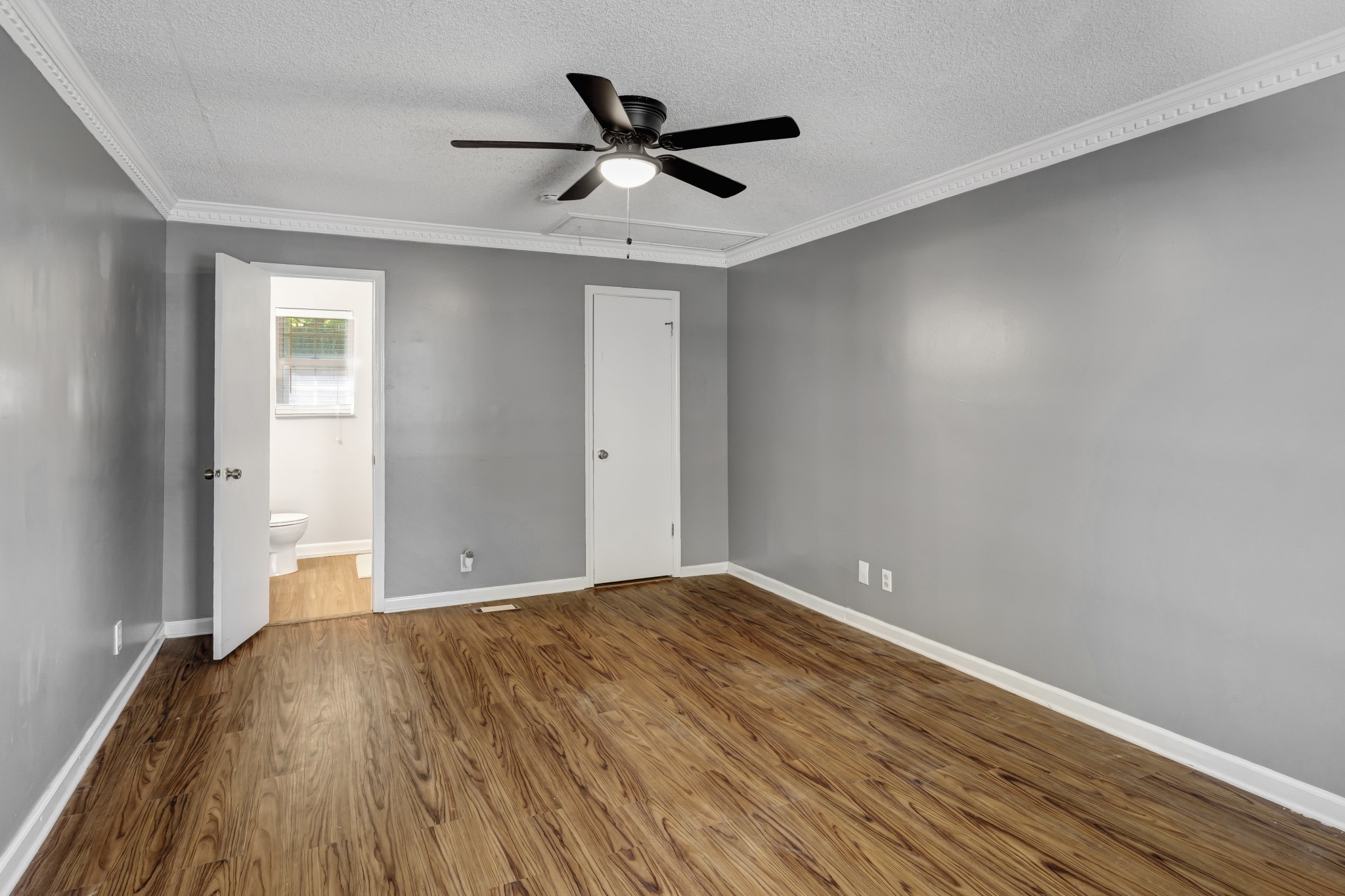 1060 Jacksons Valley Road Hermitage, TN 37076 - Photo 11 of 19 a view of room with wooden floor and a ceiling fan