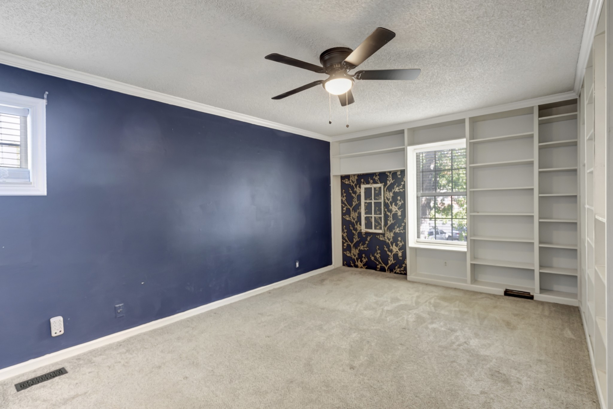 1060 Jacksons Valley Road Hermitage, TN 37076 - Photo 14 of 19 a view of an empty room with a window and a kitchen