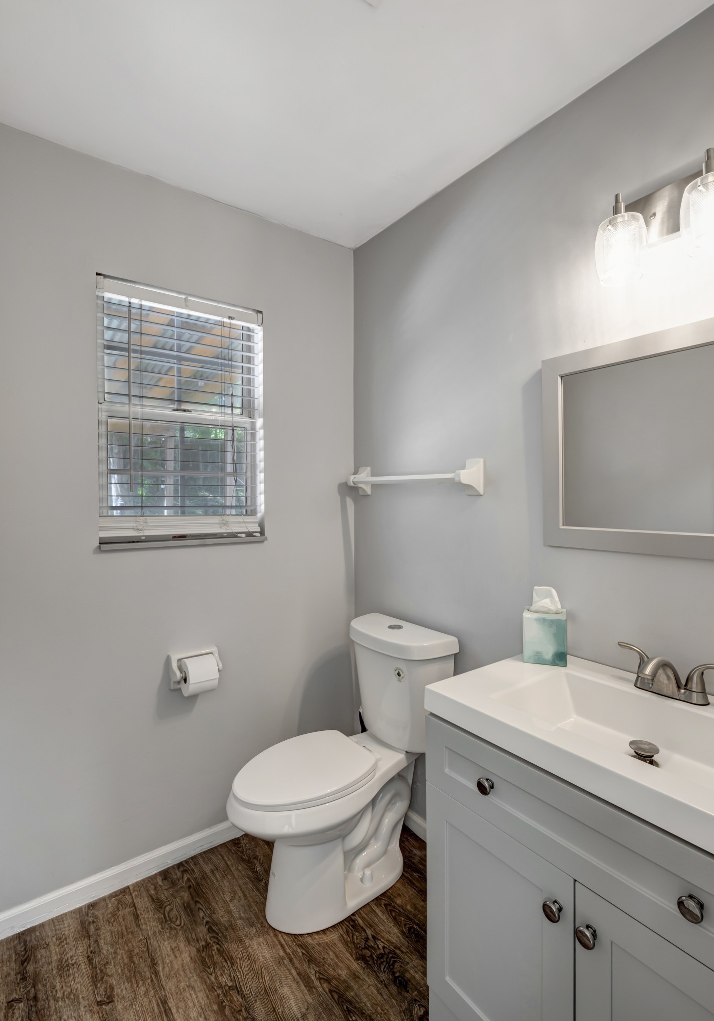 1060 Jacksons Valley Road Hermitage, TN 37076 - Photo 9 of 19 a bathroom with a toilet a sink and mirror