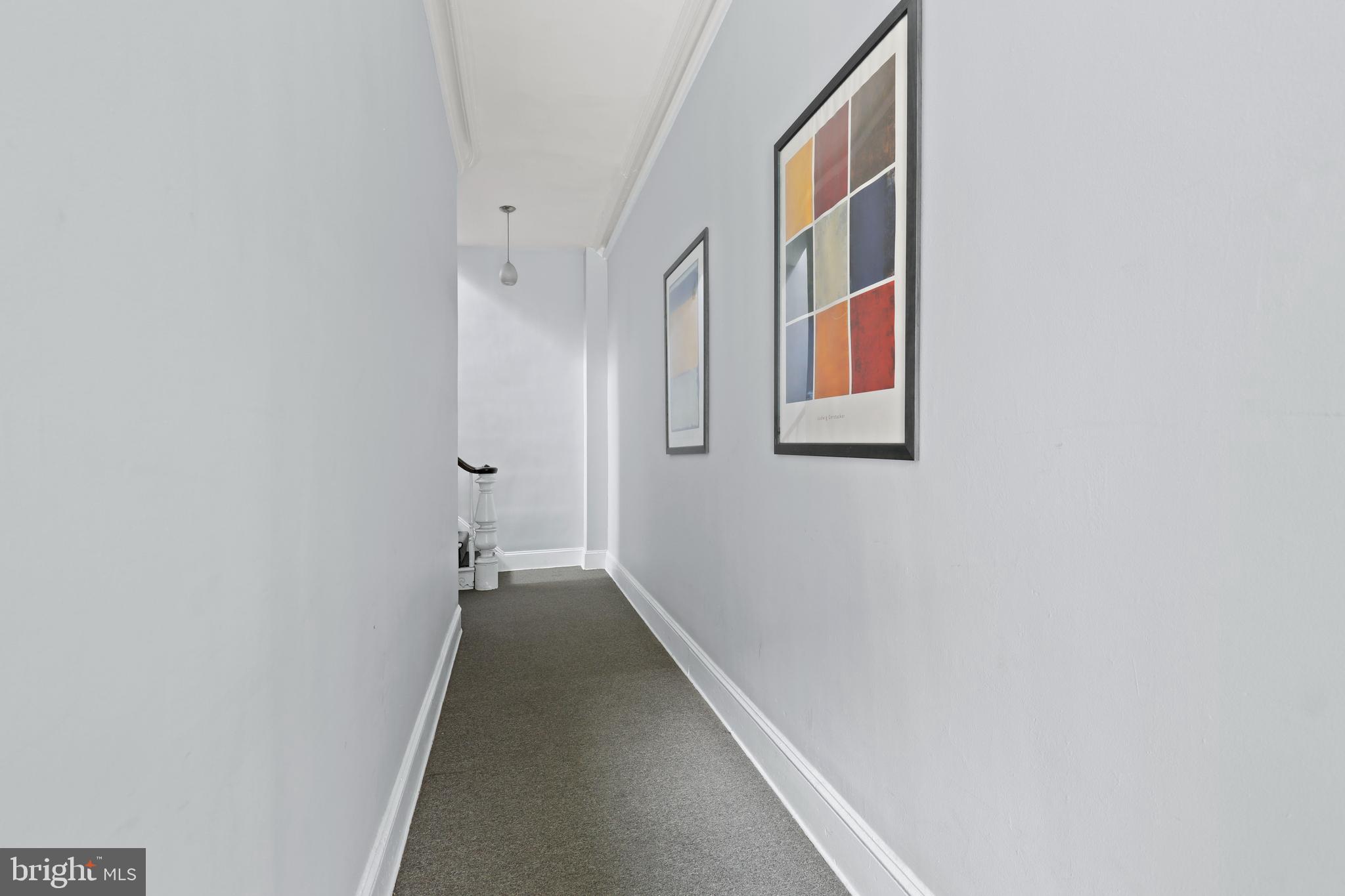 1435 Bolton Street, Unit 2 Baltimore, MD 21217 - Photo 16 of 45 Entry hall to stairs