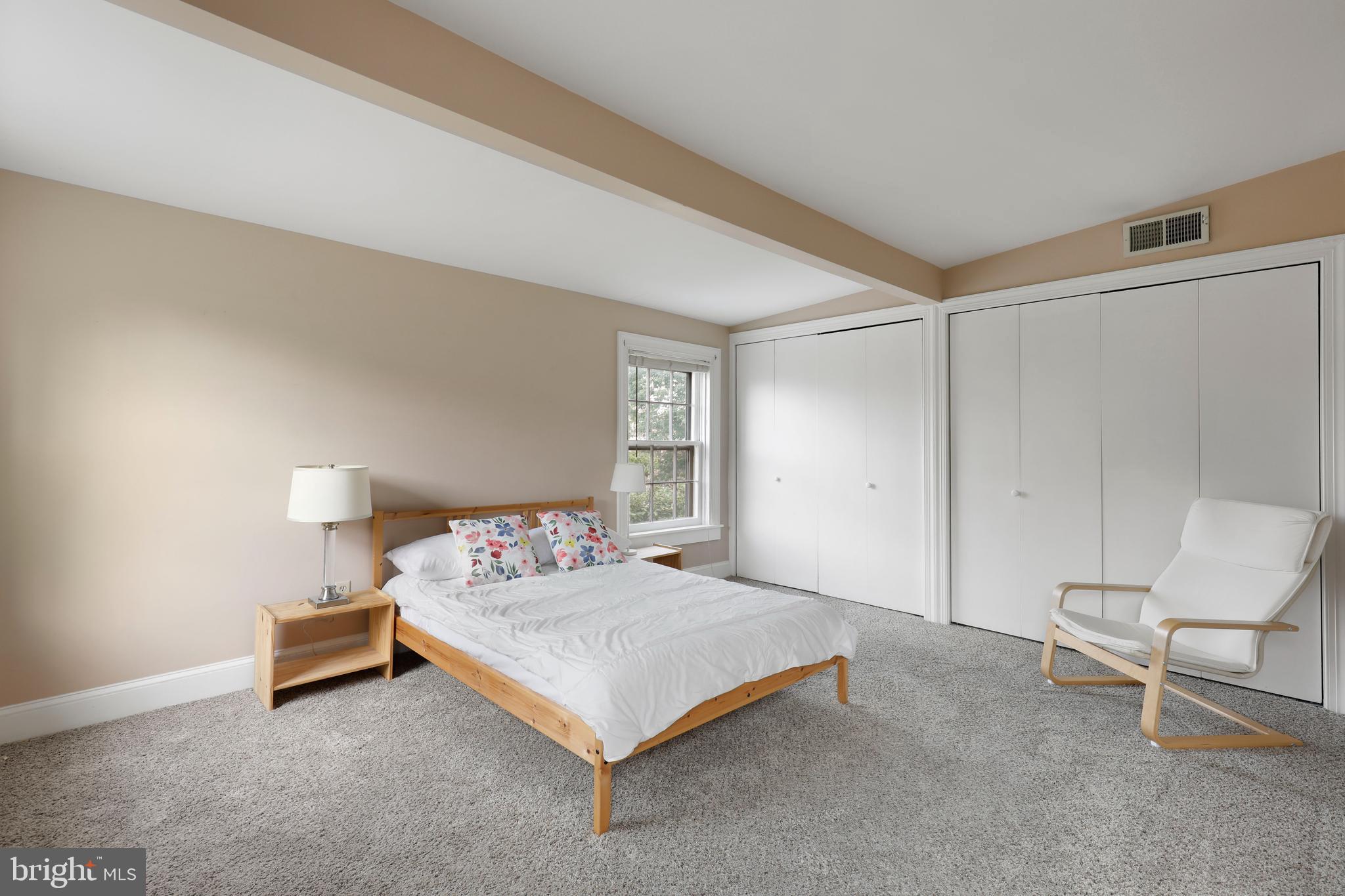 1435 Bolton Street, Unit 2 Baltimore, MD 21217 - Photo 39 of 45 Fully furnished bedroom with four windows total