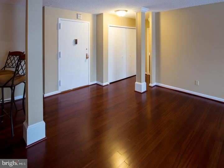 5225 Pooks Hill Road, Unit 120N Bethesda, MD 20814 - Photo 4 of 18 Spacious entryway with warm wood floors.
