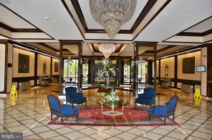 5225 Pooks Hill Road, Unit 120N Bethesda, MD 20814 - Photo 8 of 18 Elegant lobby with luxurious decor.