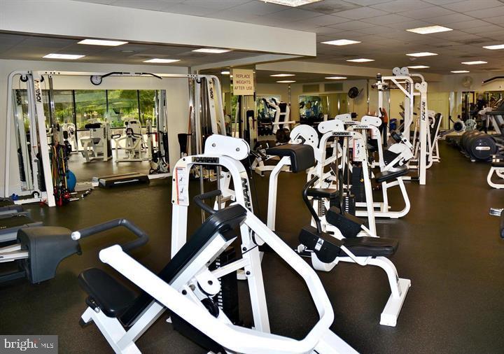 5225 Pooks Hill Road, Unit 120N Bethesda, MD 20814 - Photo 9 of 18 Modern fitness center with ample equipment.