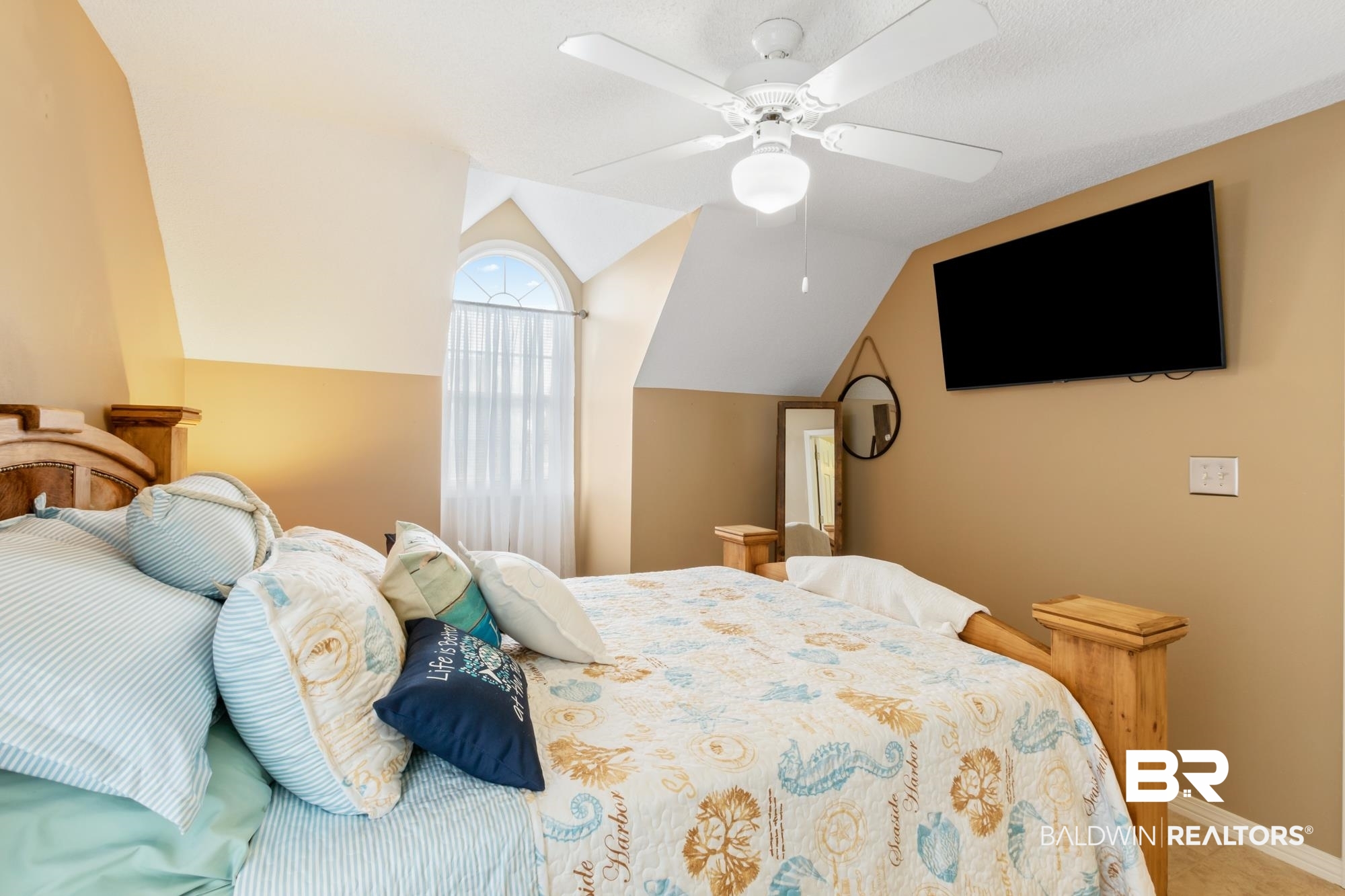 328 Windmill Ridge Road Gulf Shores, AL 36542 - Photo 25 of 47 Bedroom with lofted ceiling and ceiling fan