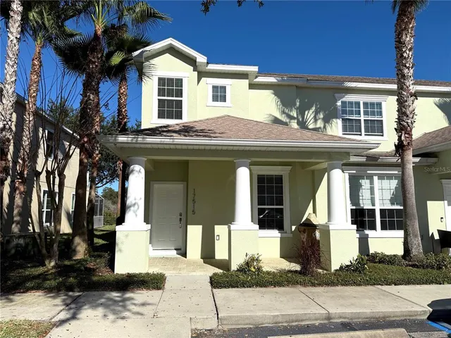 a front view of a house with a porch